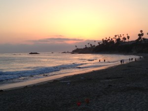 The sun sets over the Pacific, view from downtown's Main Beach
