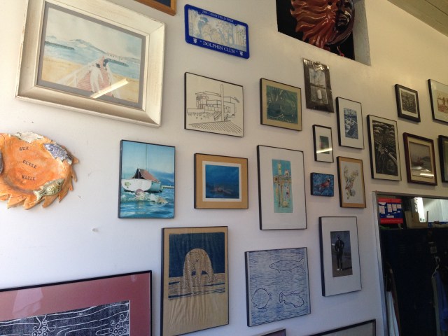 Wall near Joe Illick's locker has become a gallery of Joe's art creations.